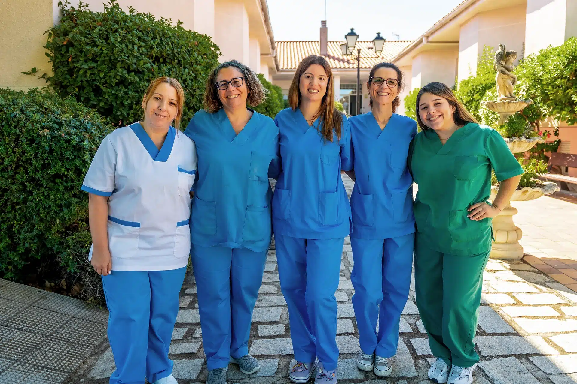 Home Health Care Aides outside in Broward County Florida lined up for a group picture.