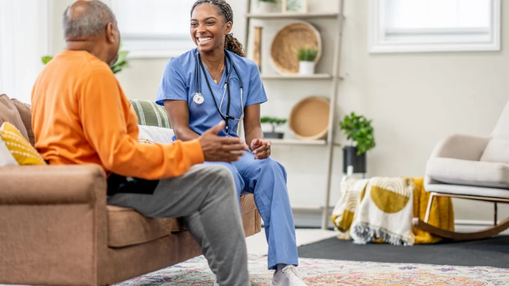 Healthcare professional talking with an elderly person in Central & Southern, FL