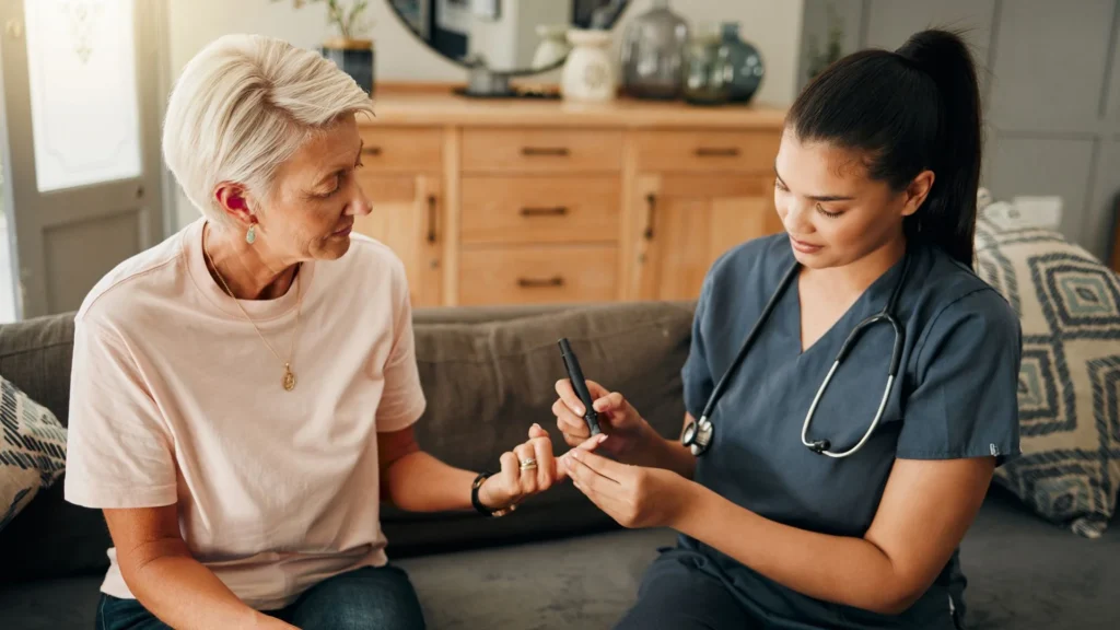 Healthcare worker assisting an adult with a diabetes test in Central & Southern Florida