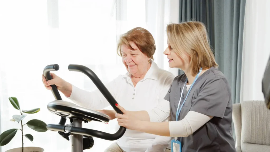 Care assistant helping an older adult for cardiac rehab post-surgery in Central & Southern Florida